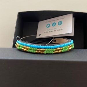 Ubuntu life beaded bracelet blue, green & gold. Handmade in Kenya. New with tag.